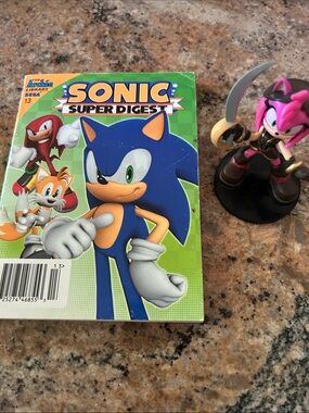 Sonic Super Digest Comic Book and sonic figurine